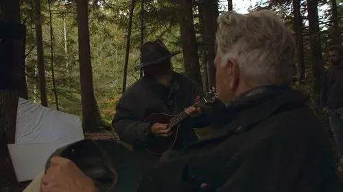 The Man with the Gray Elevated Hair